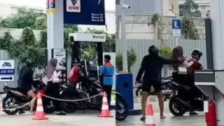  Girl busy with phone sitting on strangers bike