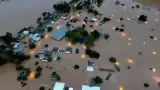 brazil flood rains leave at least 57 dead force 70,000 from homes dozens missing