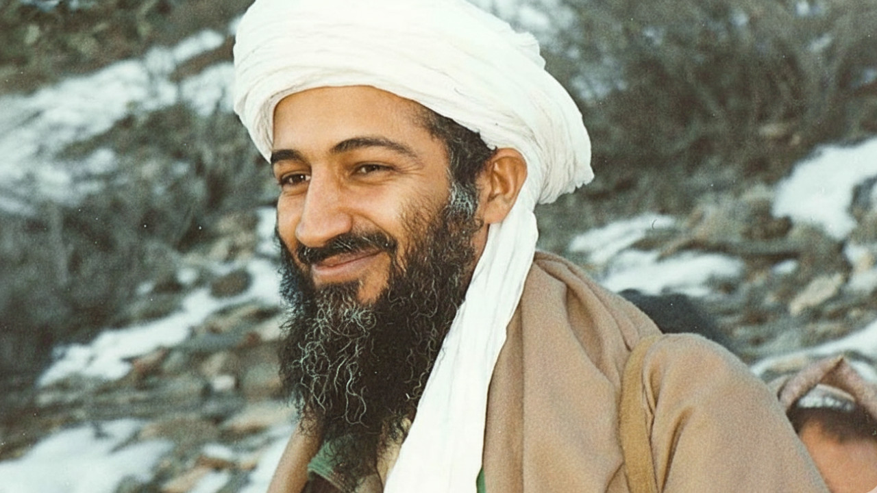 Osama bin Laden escaped from Afghanistan disguised as a woman, former CIA officer reveals.