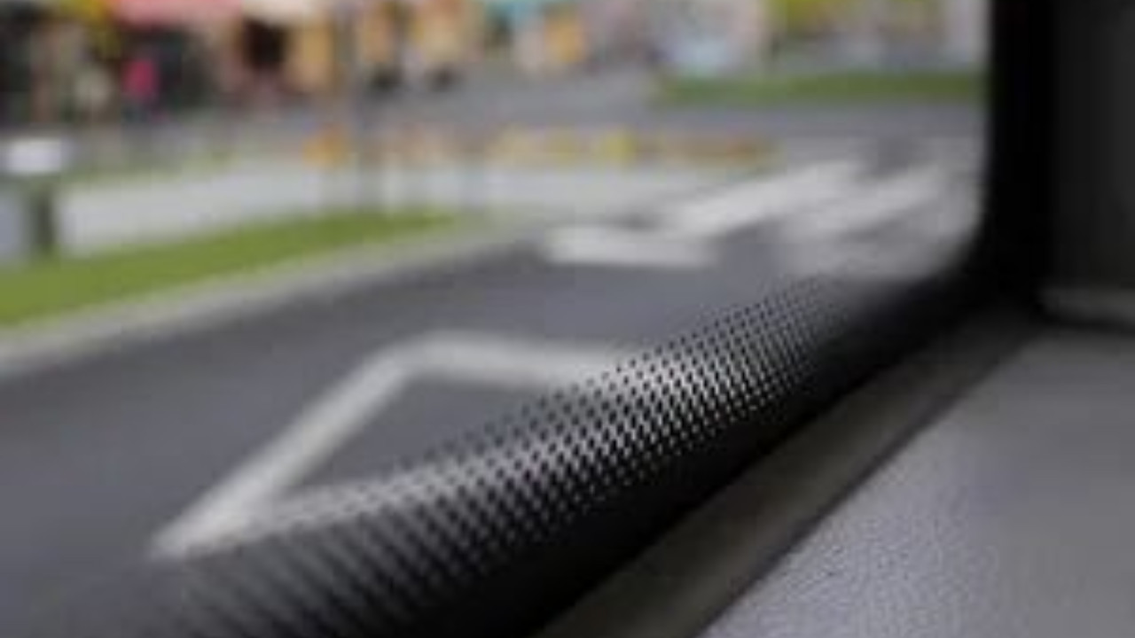 Purpose of black dots on car windshield