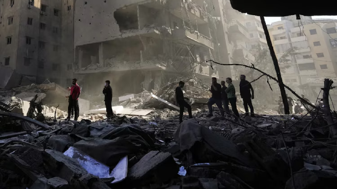 Dahiyeh Smoke still rising from wreckage