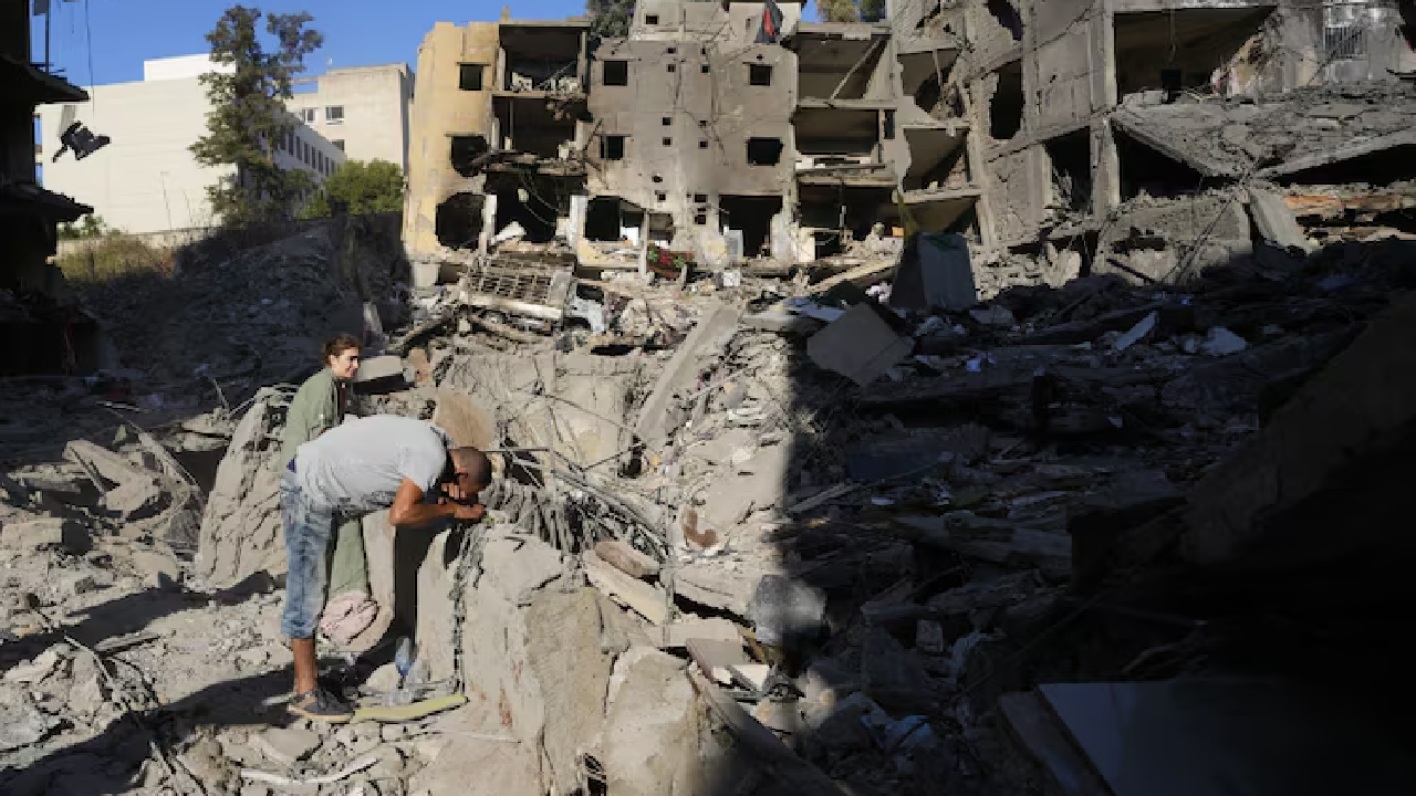 Dahiyeh Smoke still rising from wreckage