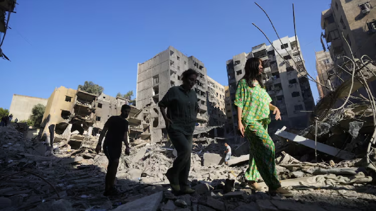 Dahiyeh Smoke still rising from wreckage