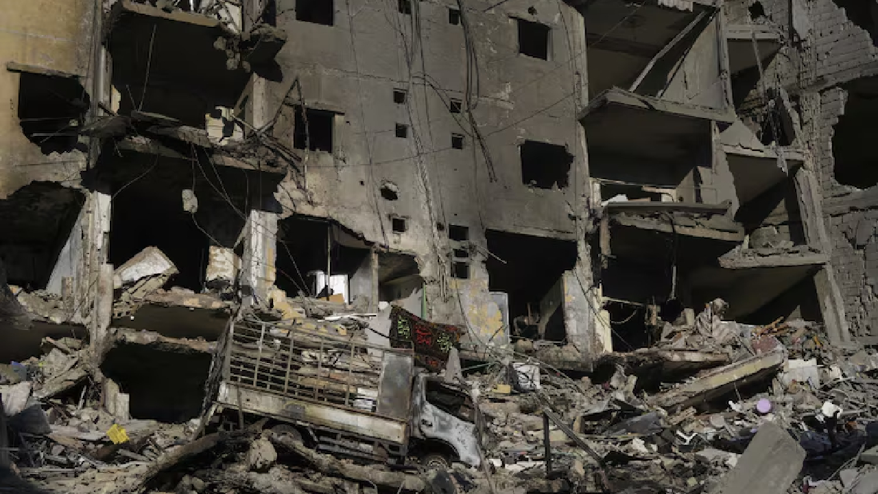 Dahiyeh Smoke still rising from wreckage