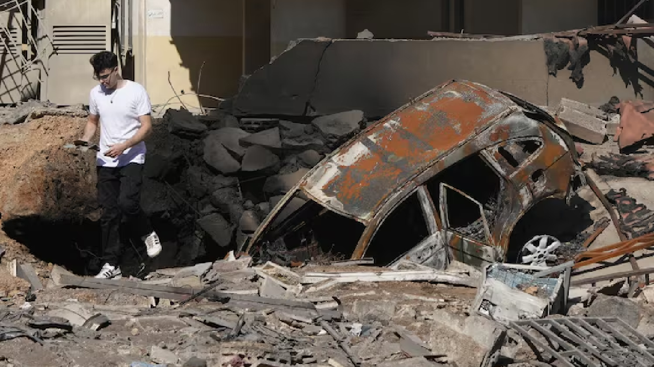 Dahiyeh Smoke still rising from wreckage