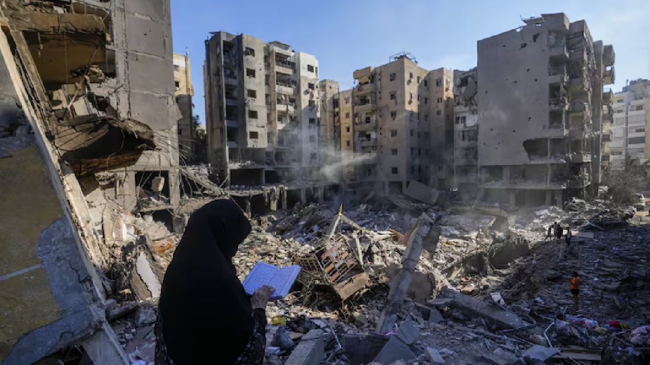 Dahiyeh Smoke still rising from wreckage